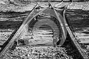 Grayscale closeup shot of train tracks in Rivas-Vaciamadrid, Spain