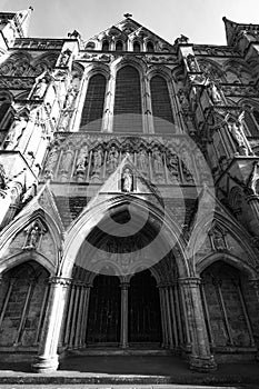 Grayscale of the entrance of Salisbury Cathedral, England
