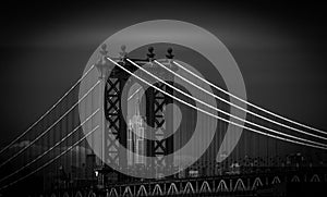 Grayscale of Manhattan Bridge in New York on a gloomy day