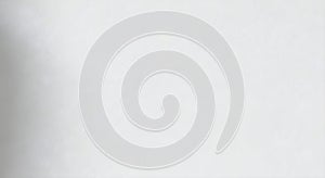 A grayscale pixelated image with a white background and subtle gradient