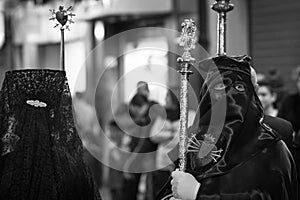 Grayscale of the Semana Santa procession in a church in Spain photo