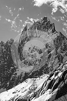 Grayscale shot of the beautiful snowy Mer de Glace in the French Alps photo