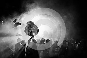 Grayscale shot of a holy ritual. Siliguri, India