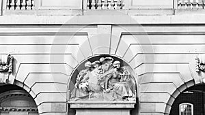 Grayscale shot of the Justice, Prudence and Liberality sculpture