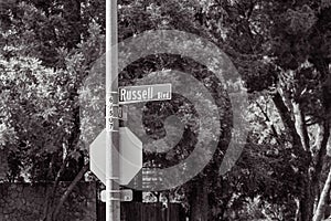 Grayscale shot of Russell Blvd street sign in Davis, California