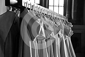 Grayscale shot of a set of tunics worn by the monks of the Monastery of Montserrat