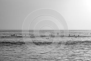 Grayscale shot of a surf line-up in a North Pacific beach in Guanacaste Costa Rica.