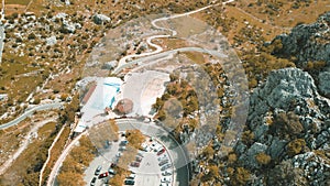 Grazalema, Andalusia. Aerial view of whitewashed houses sporting rust-tiled roofs and wrought-iron window bars