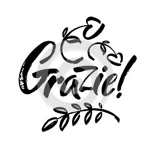 Grazie - thank you in Italian. Calligraphy inscription, black word on white background. Handwritten note