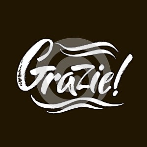 Grazie - thank you in Italian. Calligraphy inscription, white word on black background. Handwritten note. Vector