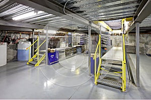 A grease pit in an automotive repair facility.