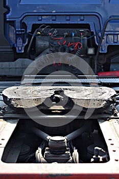 Greased truck coupling mechanism