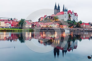 Great autumn view of oldest overlooking the River Elbe castle - Albrechtsburg. Gorgeous eveneig cityscape of Meissen, Saxony,