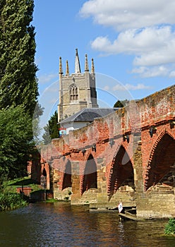 Great  Barford  Packhorse Bridge and All Saints Church  Tower. Bedfordshire England.