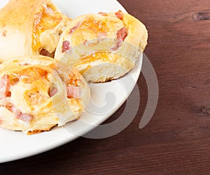 Great breads with cubed bacon on wood table