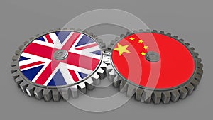 Great Britain and China Country Flags with Mechanical Gears Representing economy cooperation, strong ties