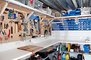 Workshop area in a home garage with organisation of tools and DIY equipment