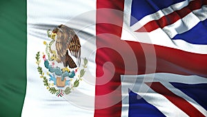 Great Britain and Mexica politicians exchanging top secret envelope against flag