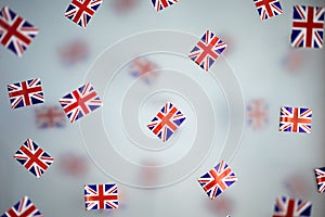 Great Britain, national holiday country. Mini flags on a transparent foggy background. concept patriotism, pride and