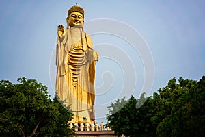 Great Buddha standing statue at Fo Guang Shan monastery in Kaohsiung Taiwan photo