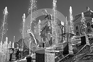 Great cascade. It consists of many fountains and is decorated with bronze gilt sculptures. Petergof, Russia. Black and