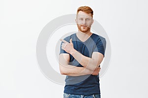 Great choice for cool guys like me. Portrait of confident charming redhead caucasian guy with bristle in casual outfit