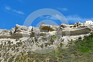 Rough cliffs from the sitio in Nazare, Centro - Portugal photo