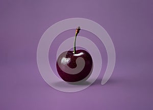 Great closeup of a ripe cherry on light violet background