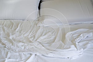 Great concept of bed messy, unkempt, white bed, crumpled sheet