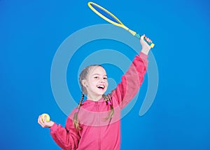 Great day to play. Athlete kid tennis racket on blue background. Active leisure and hobby. Tennis sport and