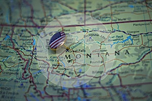 Great Falls, Montana pinned on a map with USA flag photo