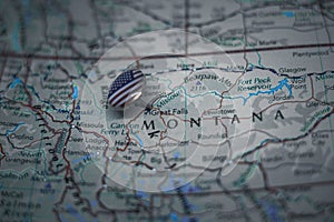 Great Falls, Montana pinned on a map with USA flag photo