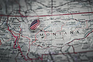 Great Falls, Montana pinned on a map with USA flag photo