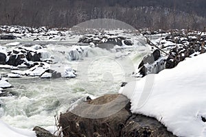 Great Falls Waterfall in Winter with Snow Covered Rocks