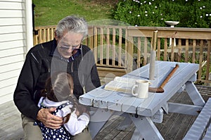 Great Granddad hug his great grandchild