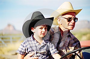 Great Grandfather and Grandson on Tractor