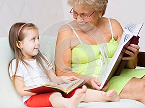 Great-grandmother reading a book