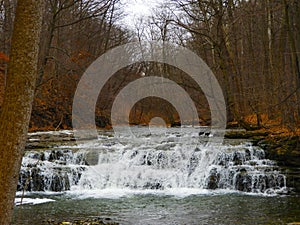 Great Gully Creek FingerLakes Falls in late winter season photo