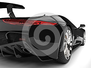 Great jet black modern elegant super car - taillight closeup shot