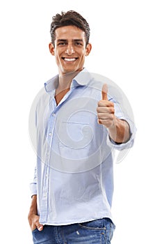 Great job. Portrait of a handsome smiling young man showing thumbs up against a white background.