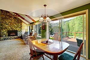 Great living room and dining interior in American country house.