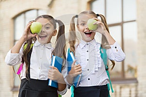 That is great. lunch time at school break. happy kids in uniform. learning subject together. modern education for girls