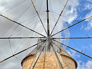 The Great Mill speaks to the clouds of the blue sky photo