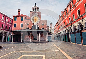 Great morning view of San Giacomo di Rialto church. Colorful spting cityscape of Venice, Italy, Europe. Traveling concept