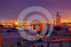 Great Mosque in Fortress of Mazagan and El Jadida cityscape at sunset