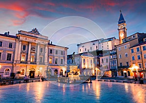 Great night view of Tartini Square in old town Piran. Splendid spring sunset in Slovenia, Europe. Traveling concept background. photo