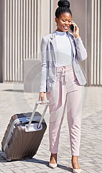 This is a great opportunity. Shot of a young businesswoman making a phone call using her smartphone.