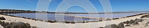 Great panoramic view of one of the lagoons with the mountains in the background with different types of birds