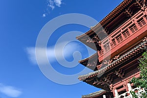Great pavilion building with cloudy blue sky