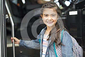 Great Portrait Of School Pupil Outside Classroom Carrying Bags